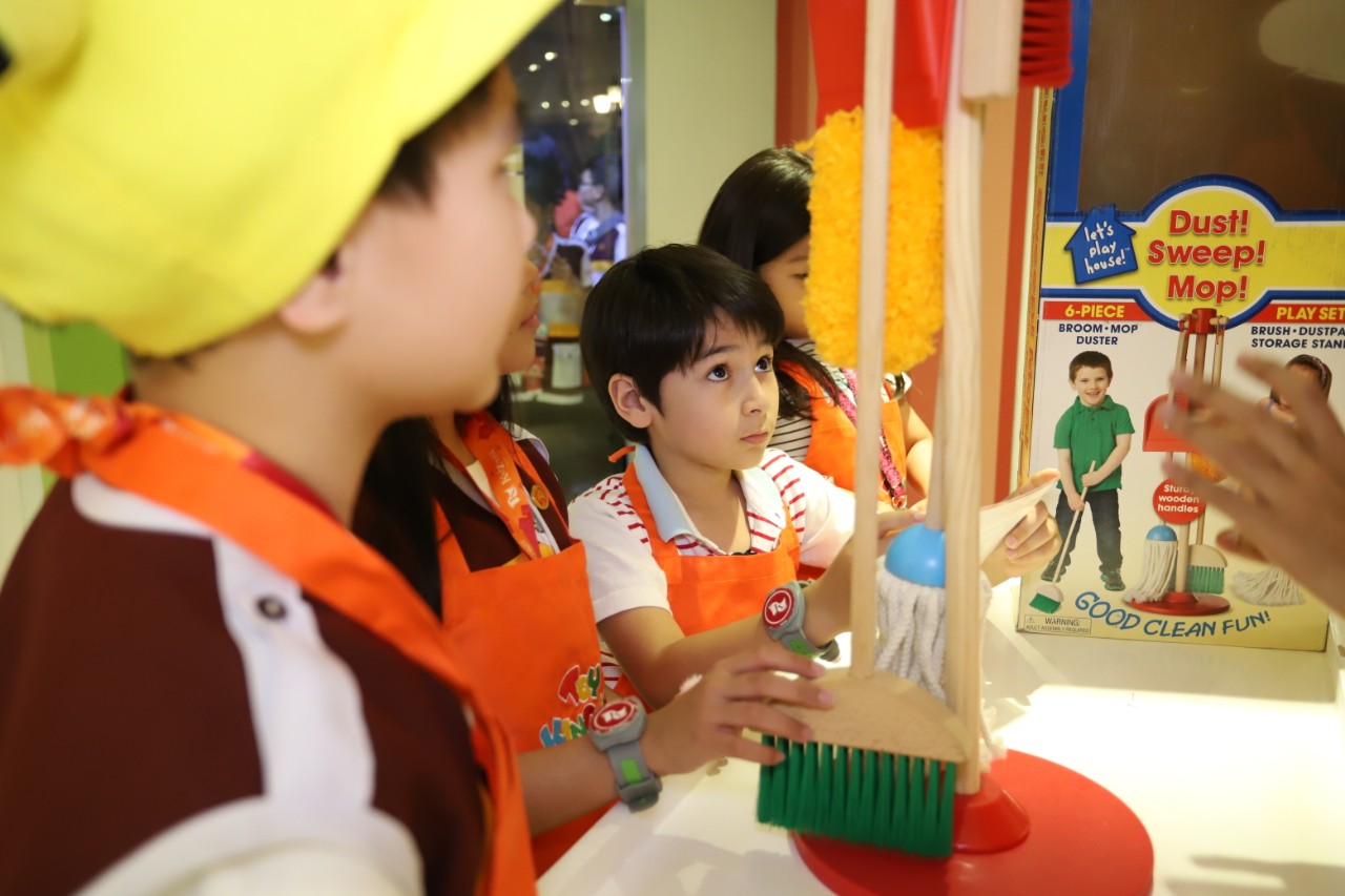 Kids like Toy Kingdom funbassador Robbie Wachtel, 3rd from left, are trained to become Selling Clerks at the new Toy Kingdom store in KidZania Manila.jpg